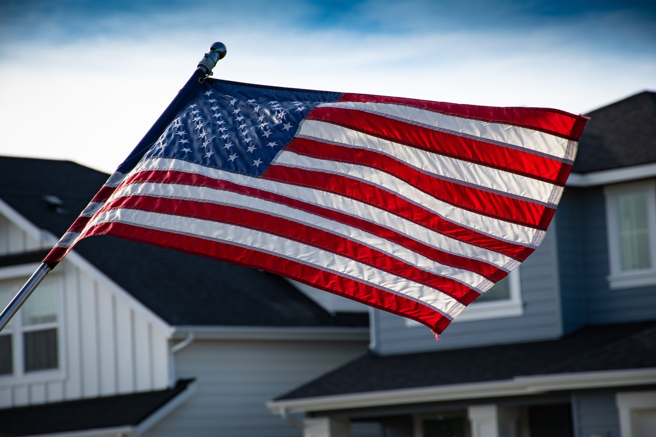 Close-Up Photography of American Flag | Breast Cancer Car Donations
