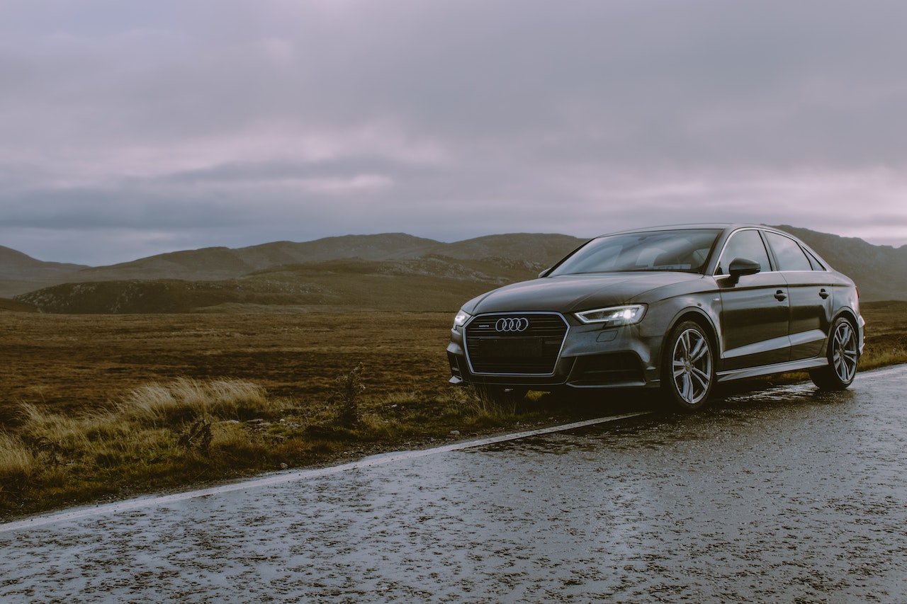 Photo of Black Audi Parked On Roadside | Veteran Car Donations
