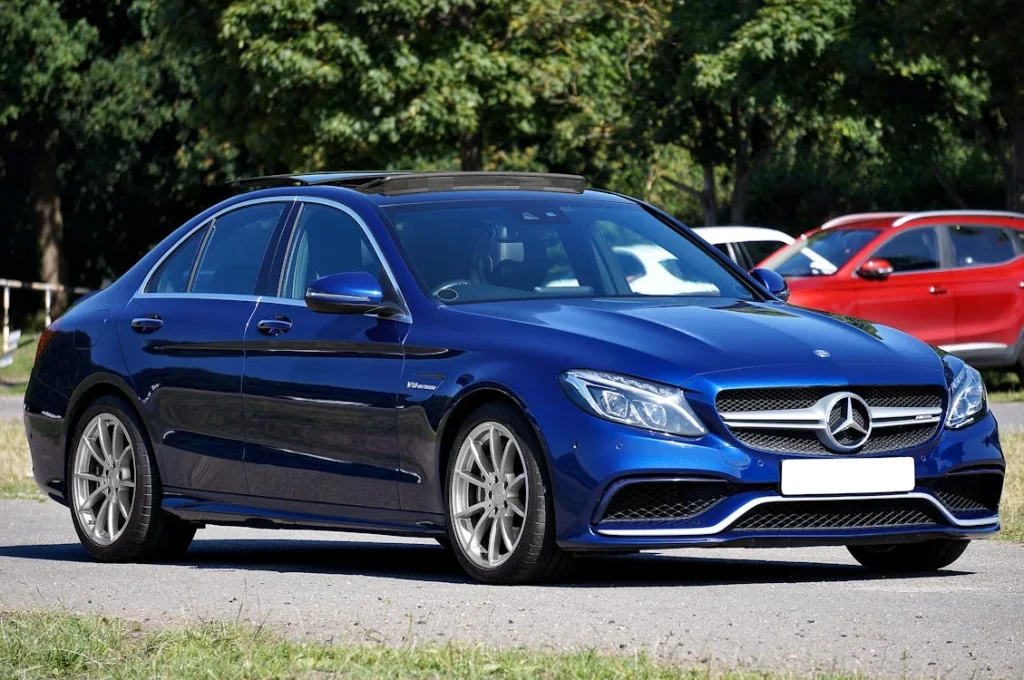 Blue Mercedes-Benz AMG C63 on a parking lot