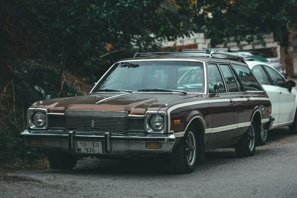 Brown vintage car parked on the street