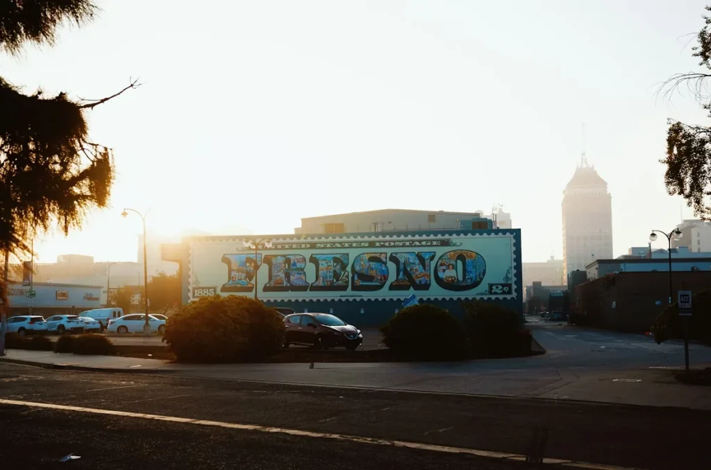 A building with a sign that says “Fresno” on the side of it