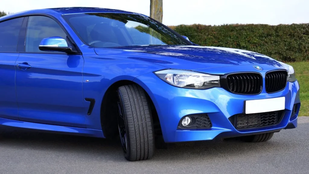 Blue BMW sedan parked outdoors showcasing sleek design and modern styling