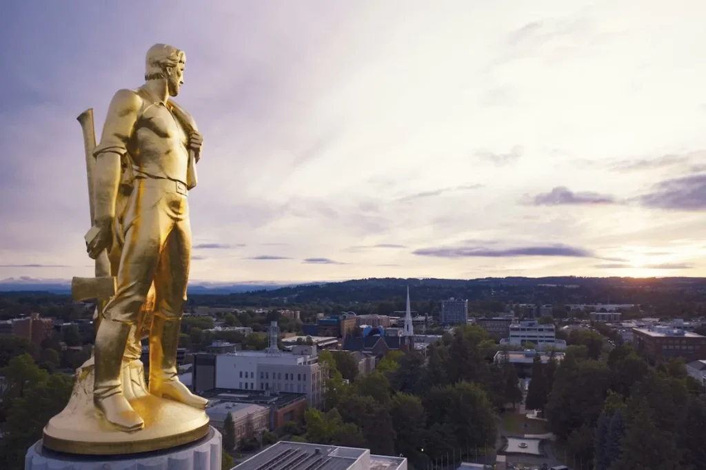 Gold pioneer statue atop the Oregon State Capitol in Salem, Oregon