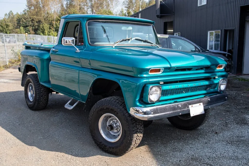 Green Chevrolet single cab pickup truck