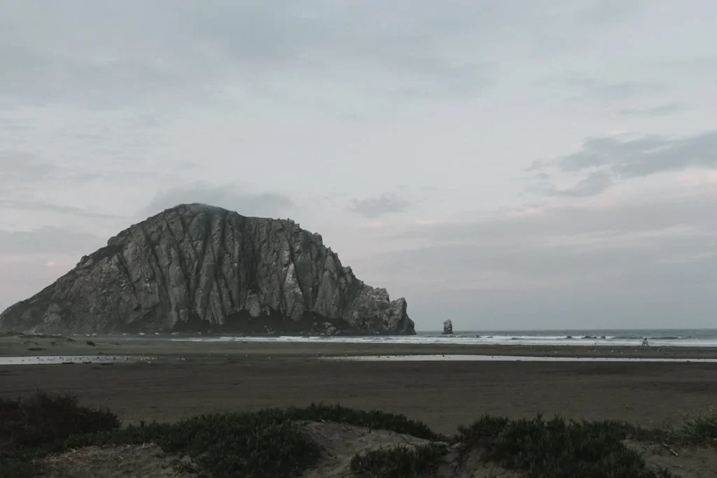Photo of rock formations on the seashore in Morro Bay, California