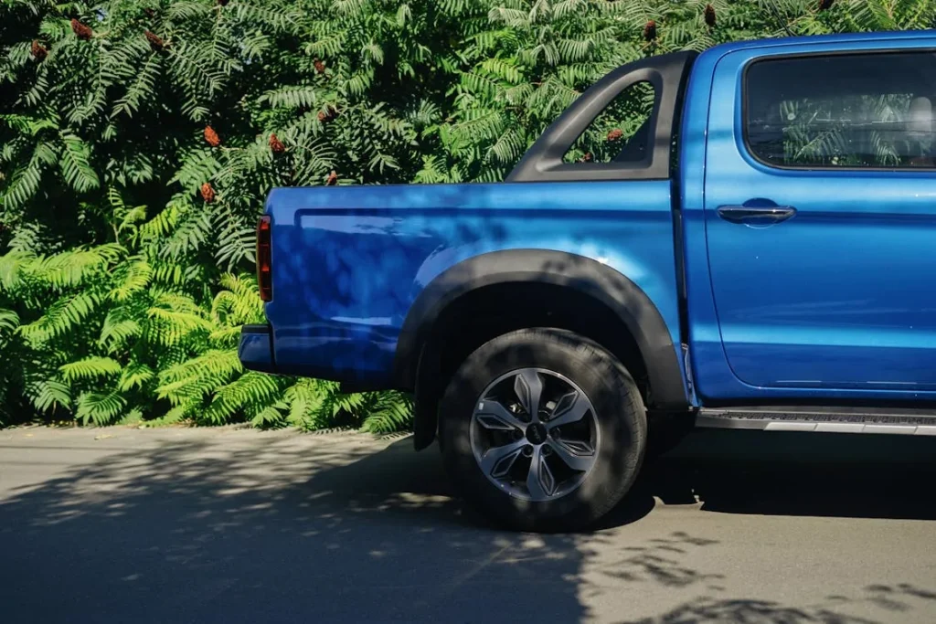 Photo of a pickup truck parked on a road