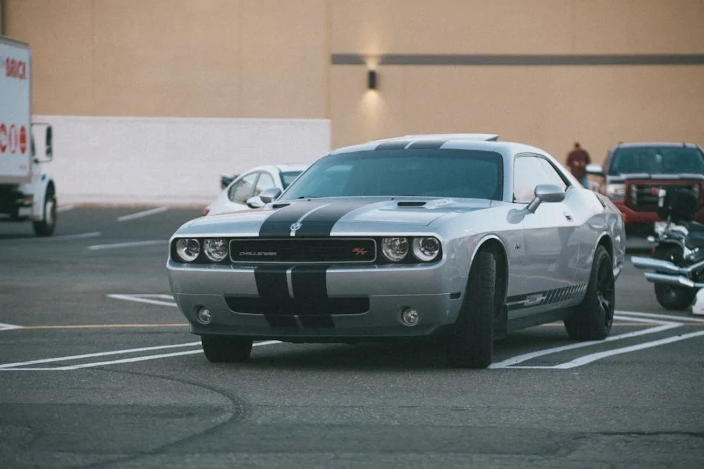 White and black Dodge Challenger parked