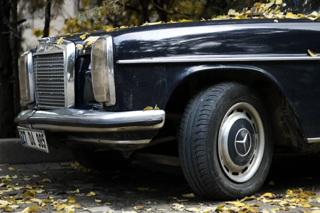 A front of a black Mercedes