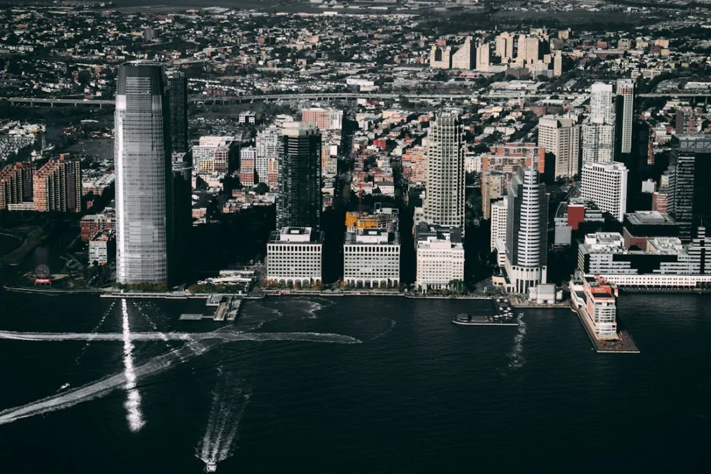 Aerial view of high-rise buildings and urban skyline along the Hudson River in Jersey City