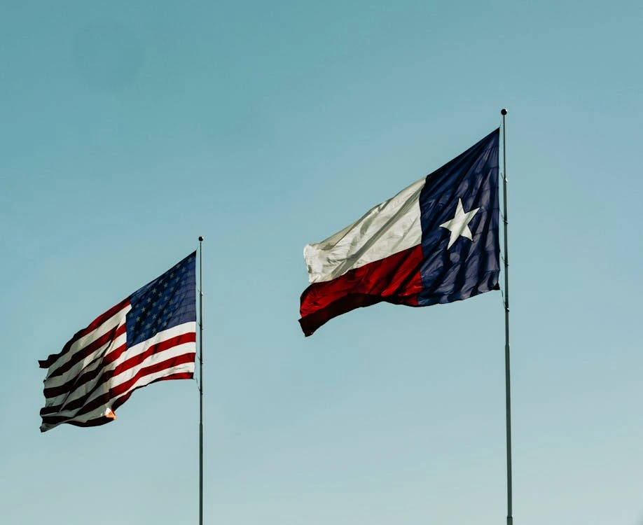 Flagss of the United States and Texas