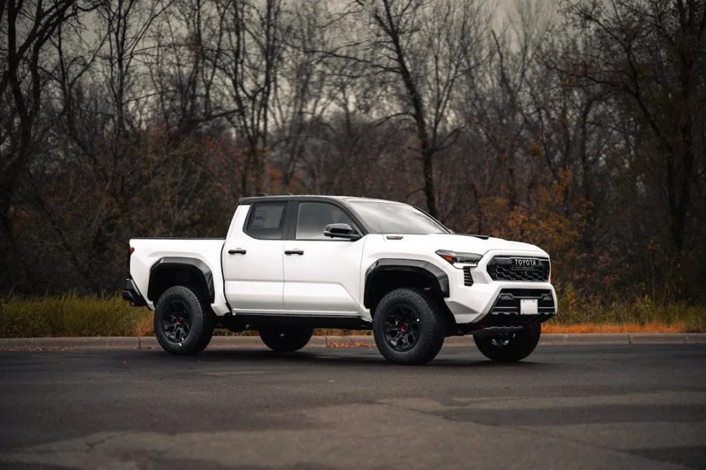 Stylish white pickup truck on a fall day