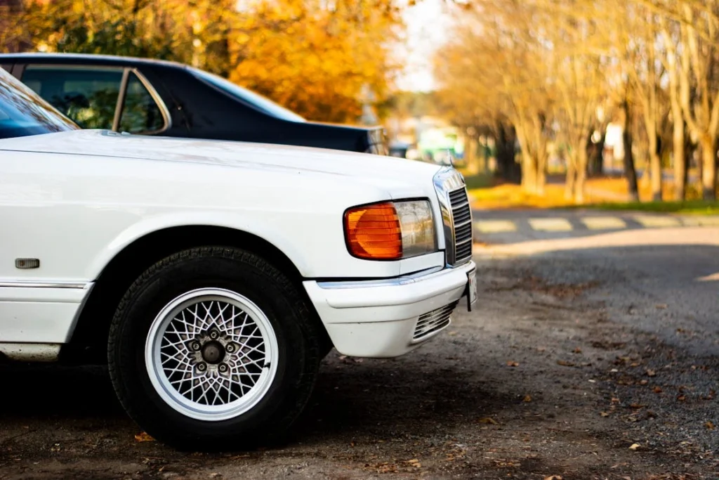 White car parked on the street side